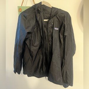 Patagonia light wind breaker! Excellent condition. Barely worn. Large